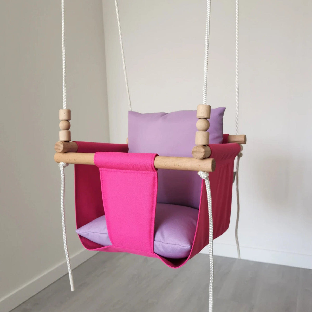 Schaukel Babyschaukel wetterbeständig Pink mit Lila Kissen