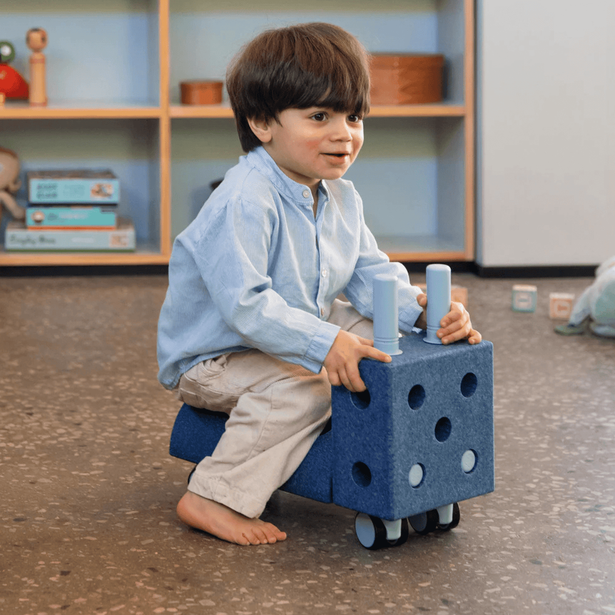 Lern- & Motorikspielzeug MODU Tiny Ride - kleiner Rutscher