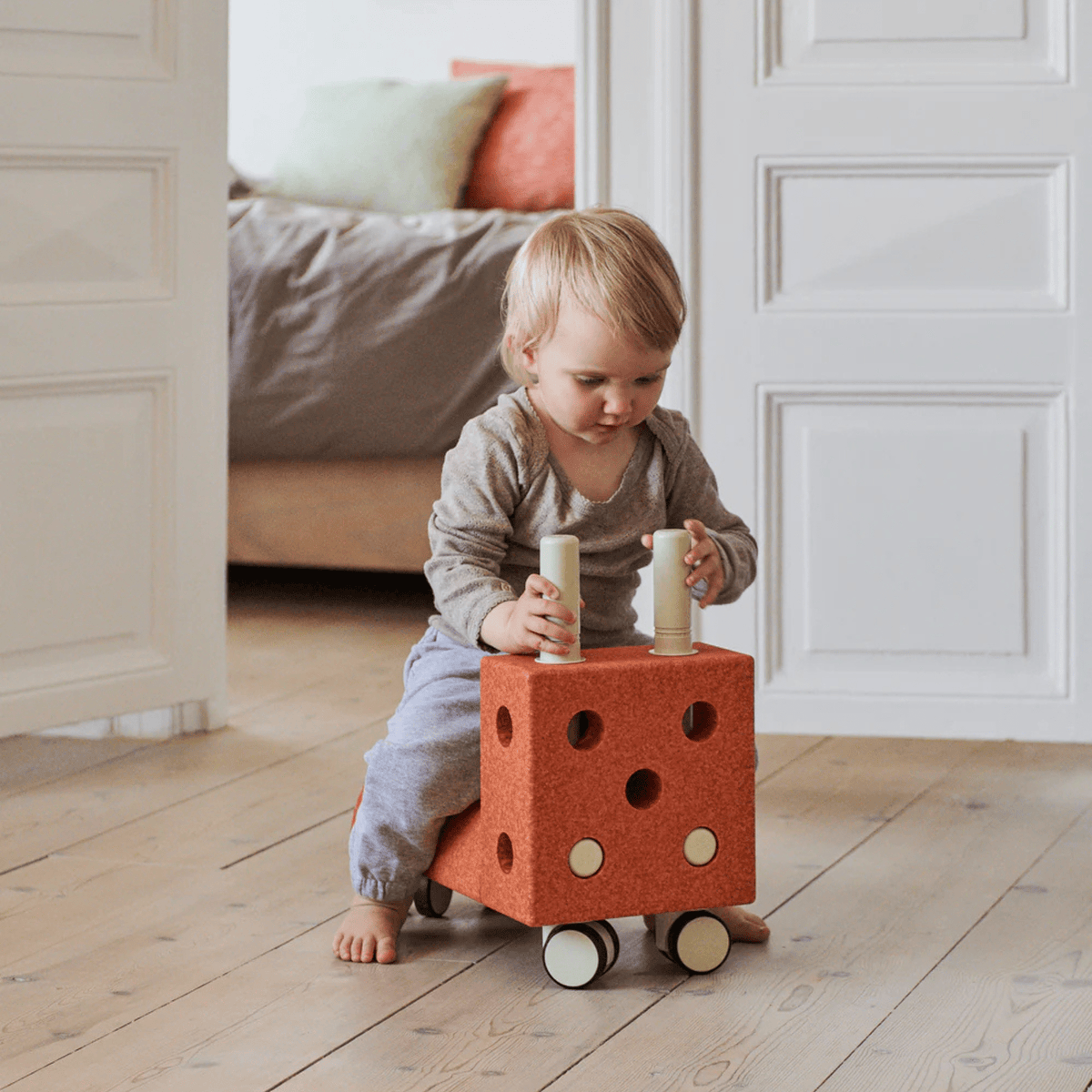 Lern- & Motorikspielzeug MODU Tiny Ride - kleiner Rutscher